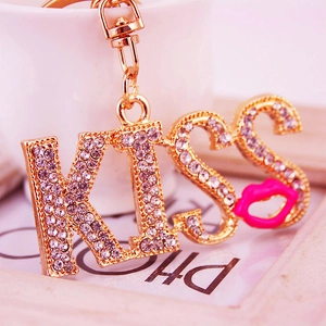 Sparkling rhinestone KISS letter keychain with pink lips pendant in gold finish