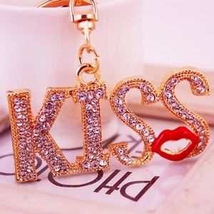 Sparkling rhinestone KISS letter keychain with a red lip charm and golden finish metal ring