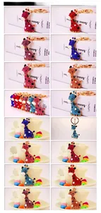 Collage de porte-clés girafe en cristal coloré avec motifs à pois et fermoirs dorés
