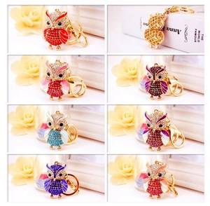 Multi-color owl keychains set with sparkling rhinestones and colorful enamel details