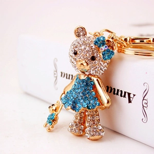 Portachiavi con orsetto di cristallo scintillante e vestito di strass blu con ciondolo