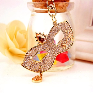 Sparkling crystal masquerade mask keychain with crown and teardrop gemstone charm