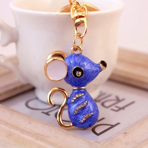 Porte-clés souris en émail bleu avec plaquage doré et cristaux sur fond de style vintage