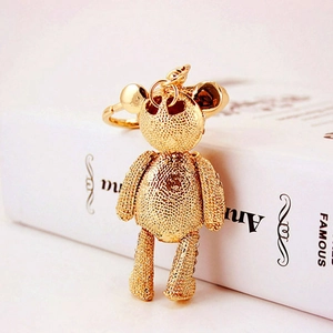 Sparkling crystal bear keychain with gold textured finish for handbags and car keys