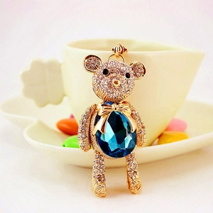 Sparkling crystal bear keychain with blue waterdrop gemstone and gold metal plating