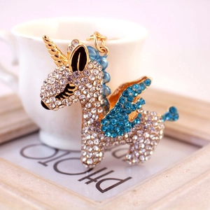 Portachiavi unicorno scintillante con ali in strass blu e finitura in lega dorata