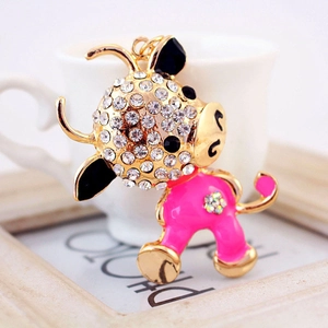 Portachiavi a forma di bue dorato con smalto rosa e strass bianchi per borse moda