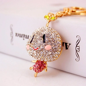 Porte-clés personnage de légume mignon avec strass brillants blancs et roses étincelants