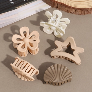 Five-piece matte hair claw set in Morandi brown tones with star, flower, and shell shapes