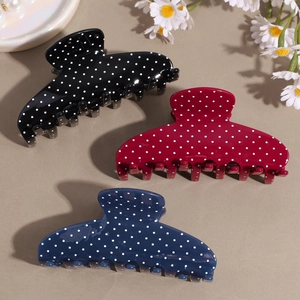 Pinze per capelli retrò a pois in nero, rosso e blu navy per uno styling molto elegante