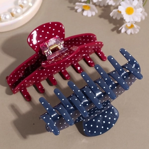 Molle per capelli vintage a pois bordeaux e blu navy per un'acconciatura elegante