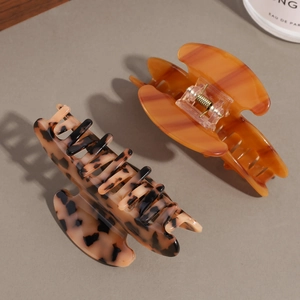 Elegant tortoise shell and amber acetate hair claws for women in vintage oval design