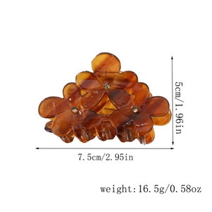 Detailed dimensions of tortoise flower hair claw clip with rhinestones and resin texture
