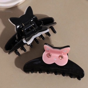 Elegant cat-shaped hair claw clips with rhinestones in black and pink acetate finish