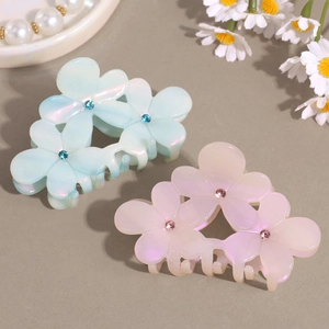 Floral iridescent acetate hair claws with rhinestones in pink and blue, set of two