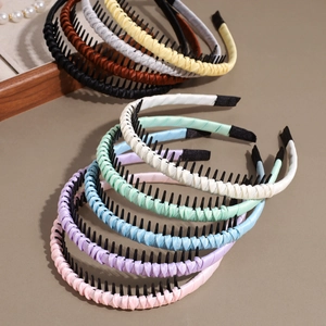 Set of eight colorful satin non-slip headbands with teeth in elegant minimalist style