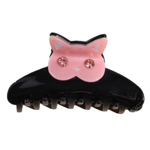 Chic black cat hair claw clip with pink acetate cat face and sparkling diamond eyes