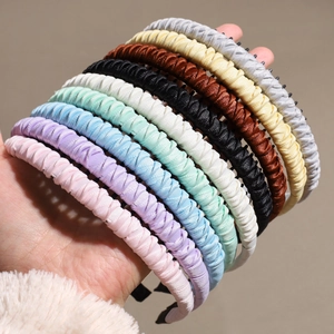 Minimalist fabric woven non-slip headbands with teeth in nine assorted pastel colors