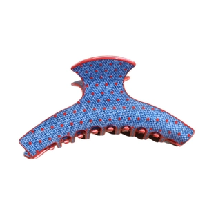 Blue denim texture hair claw clip with red polka dots and curved shark clip design