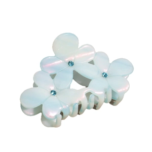 Floral acetic acid hair claw clip with blue rhinestones and pearlescent gradient finish