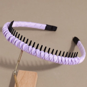 Detailed close-up of lavender woven satin headband with black non-slip inner teeth