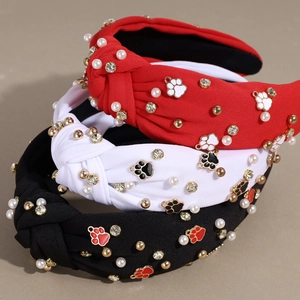 Knot headband with pearls, rhinestones and dog paw charms in red, white and black colors