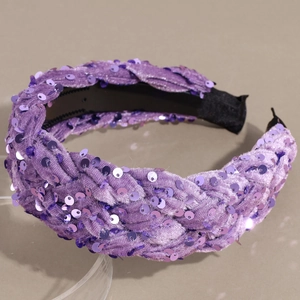 Detail of purple velvet braided headband with sparkling sequins and inner anti-slip comb