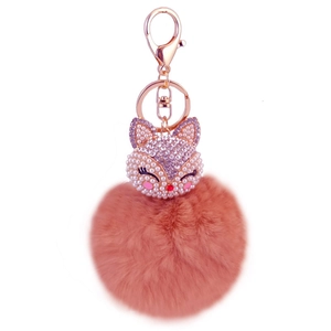 Pink faux fur pompom fox keychain with rose gold spring clasp and sparkling rhinestones