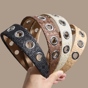 Bohemian woven raffia headband set with silver metal eyelets in four neutral colors