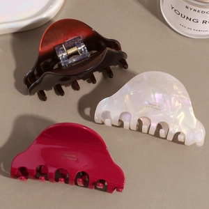 French chic acetate hair claws set in tortoiseshell, pearl white and burgundy colors
