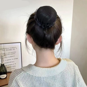 Elastic black hair net with lace trim for bun styling, back view on model hair