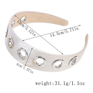 Detail of 4cm wide ivory satin headband with silver metal eyelets and suede lining