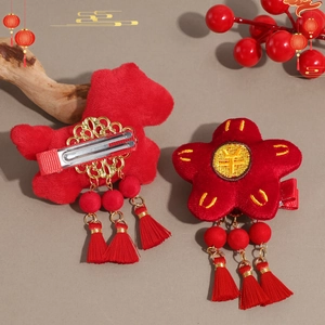 Chinese New Year red lamb wool hair clips with gold embroidery and festive tassels