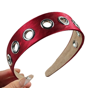Red silk wide headband with silver metal grommets and elegant vintage texture design