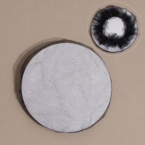 Close-up of black mesh hairnet with elastic edge showing fine netting detail