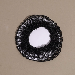 Close-up of black mesh hairnet for ballet buns and nursing hairstyles with elastic texture
