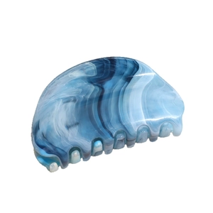 Blue marble patterned hair claw clip with geometric design for long hair styles