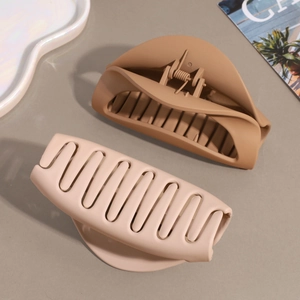 Set of minimalist matte hair claws in coffee and nude tones for versatile styling