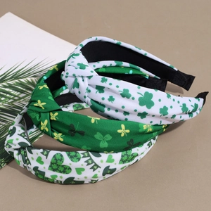 Three-piece St. Patrick's Day knotted headbands with green clover and shamrock patterns