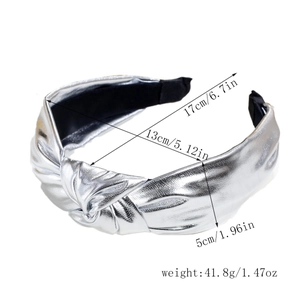 Detail view of metallic silver knotted headband showing exact size and weight dimensions