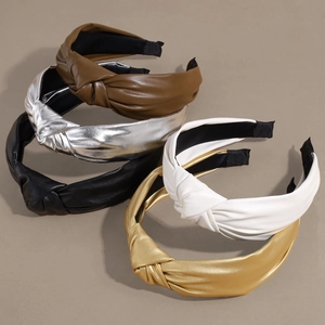 Minimalist knotted faux leather headbands in multiple solid colors for women