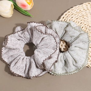 Minimalist double-layered knitted scrunchies in gray and green with contrast edge stitching