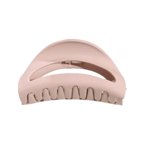 Matte pink hollow hair claw clip with a minimalist curved design for women hair styling