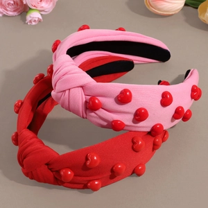 Knotted heart headband set in red and pink featuring 3D hearts for women