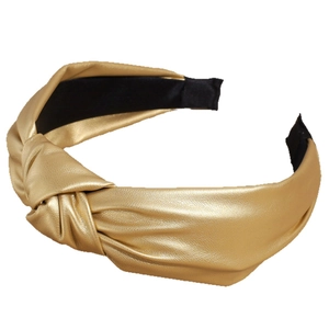 Fashionable champagne gold knotted wide headband in shiny faux leather material