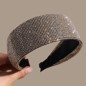 Sparkling full rhinestone headband with wide band and padded black fabric lining