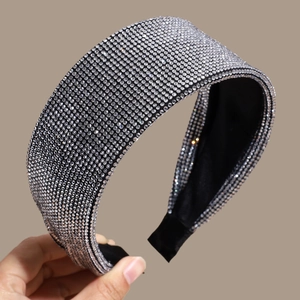 Handheld wide headband with full sparkling rhinestones and black fabric lining