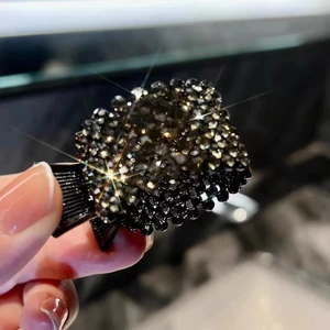 Pince à cheveux noire en métal avec strass gris fumé pour coiffure queue de cheval