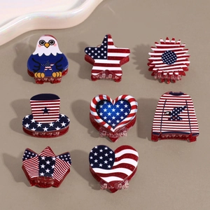 Detailed view of patriotic mini claw clips with American flag glitter patterns