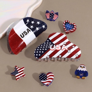 Glittery USA Flag hair claw clips set including heart and star shapes on beige background